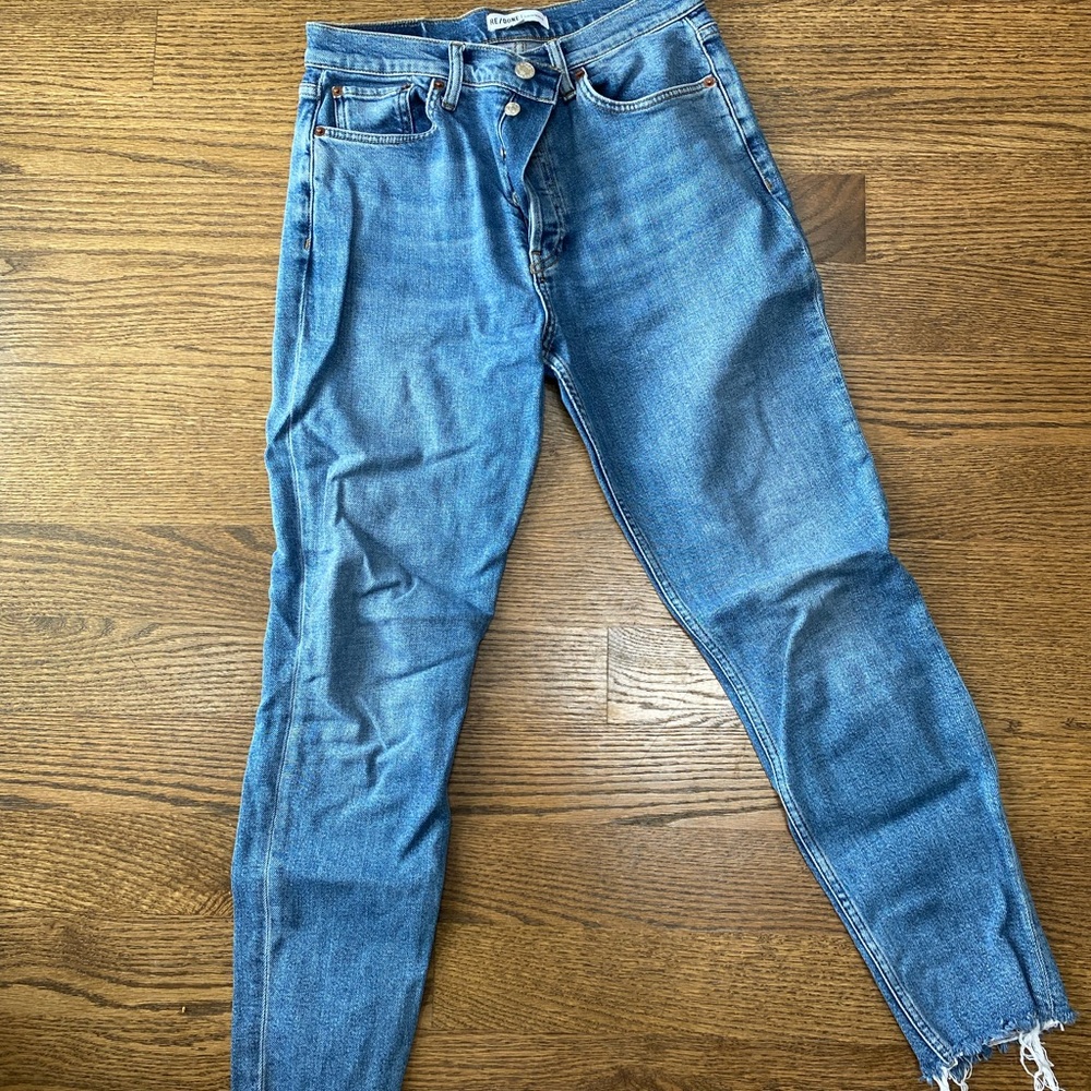 Re/done size 29 jeans with frayed bottoms